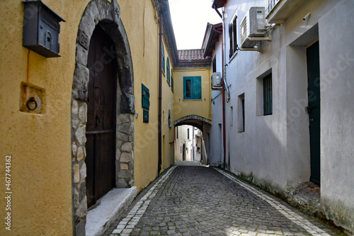 Fototapeta Naklejka Na Ścianę i Meble -  A narrow street in Castel di Sasso, a small village in the mountains of the province of Caserta, Italy.