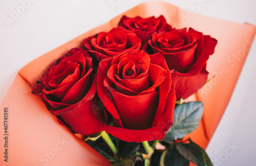 Beautiful bouquet of red roses on a white background