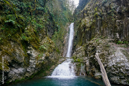 Fototapeta Naklejka Na Ścianę i Meble -  A picturesque waterfall in the jungle of the Krasnodar Territory