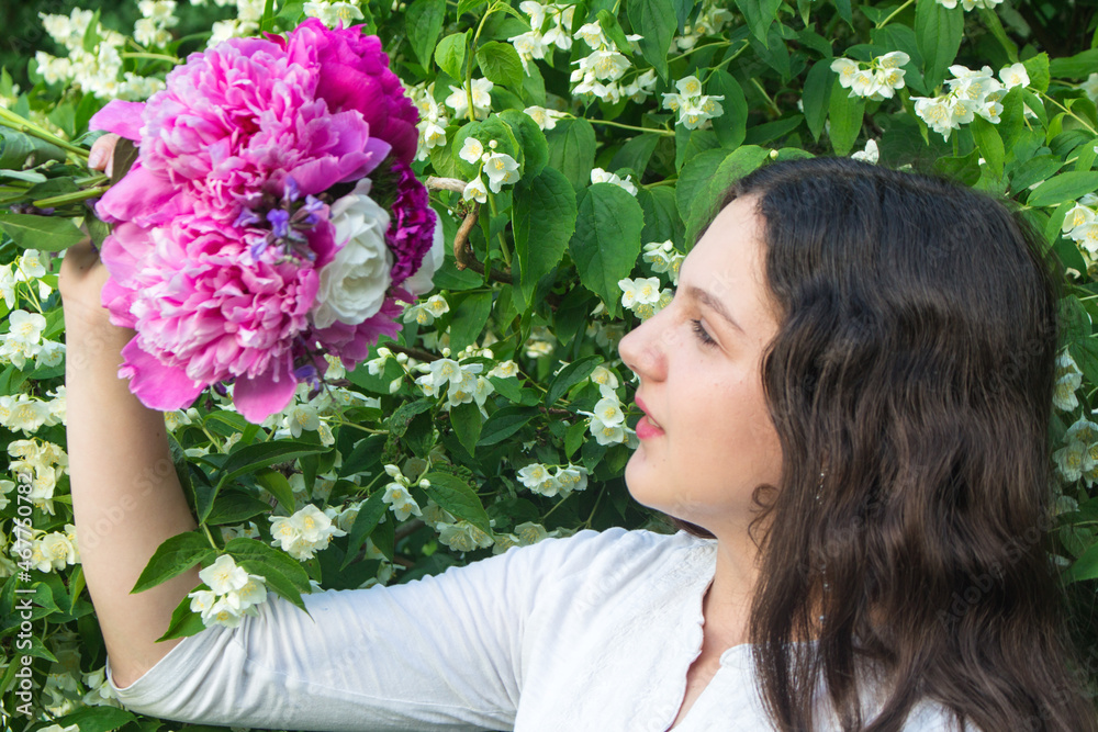 girl with a bouquet of peony