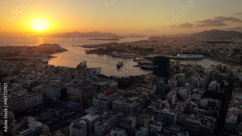 Aerial drone photo of iconic port of Piraeus at sunset with beautiful colours, Attica, Greece