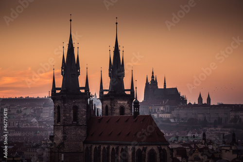 Sunset panorama of Prague Tyn Church Old Town and Prague Castle, evening panorama, towers, travel to Prague
