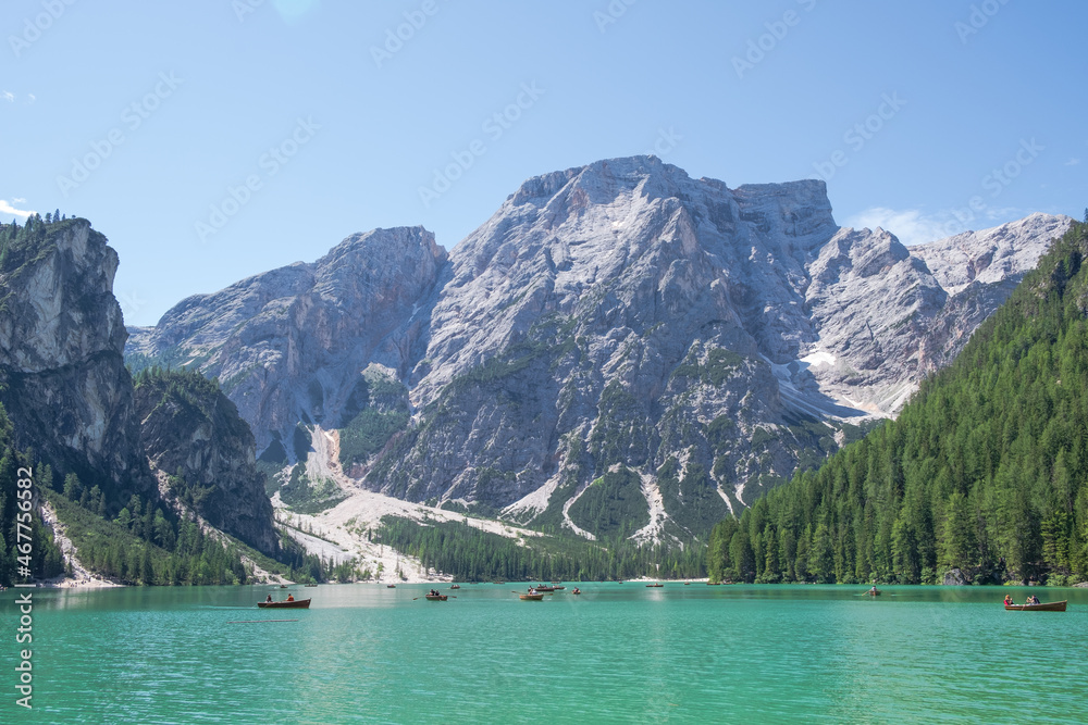 Lake Braies (also known as Pragser Wildsee or Lago di Braies) in Dolomites Mountains, Sudtirol, Italy. Romantic place with typical wooden boats on the alpine lake. Hiking travel and adventure. Lake Braies (also known as Pragser Wildsee or Lago di Braies) in Dolomites Mountains, Sudtirol, Italy. Romantic place with typical wooden boats on the alpine lake. Hiking travel and adventure.