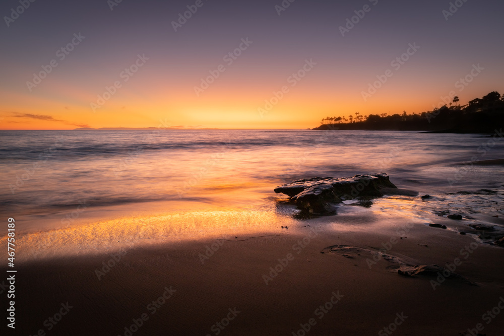 Sunset on Malibu beach in California