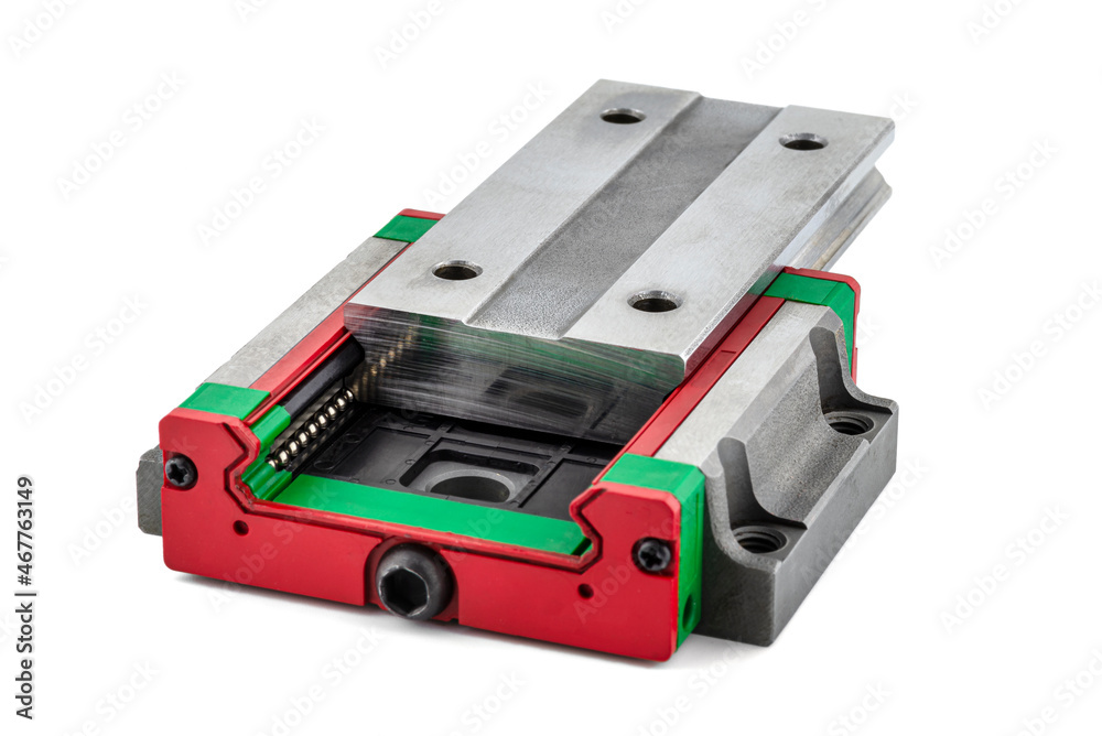 Macro photo of a old linear bearing with a linear trolley, isolated on a white background. Macro photo of a old linear bearing with a linear trolley, isolated on a white background.