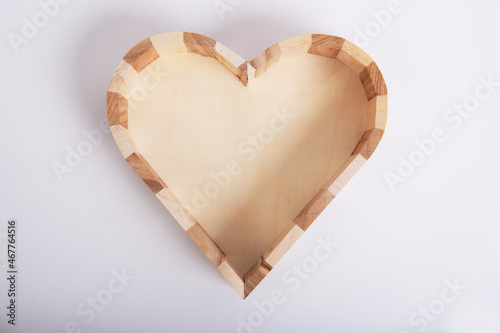 Wooden heart on an isolated white background