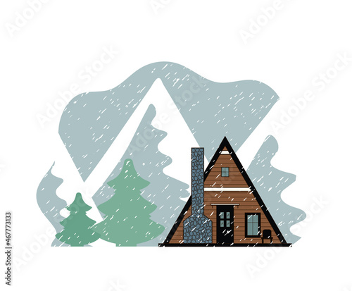 Brown wooden A-frame house with a black roof on a background of snowy mountains. A hut with a stone fireplace. photo