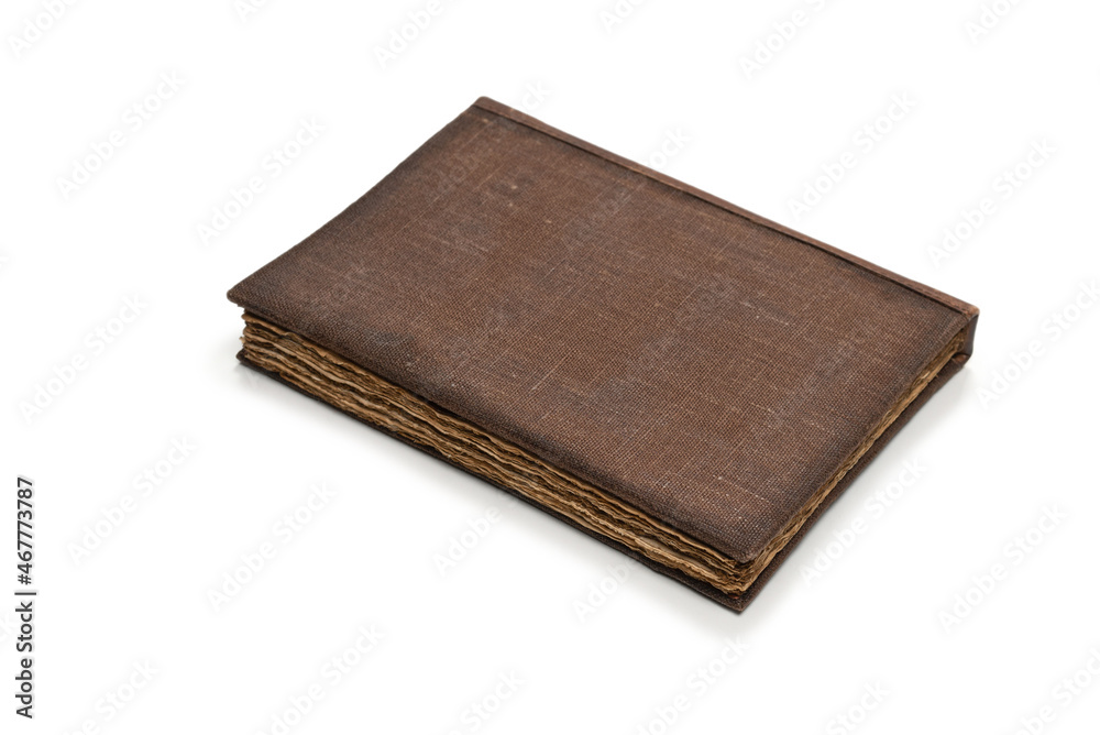 An old brown book isolated on white background. An old brown book isolated on white background.