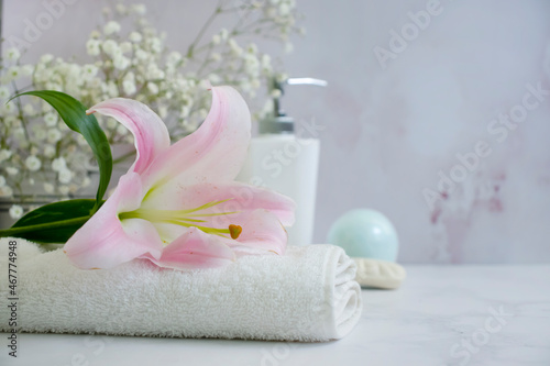 bathroom accessories, flower on marble background