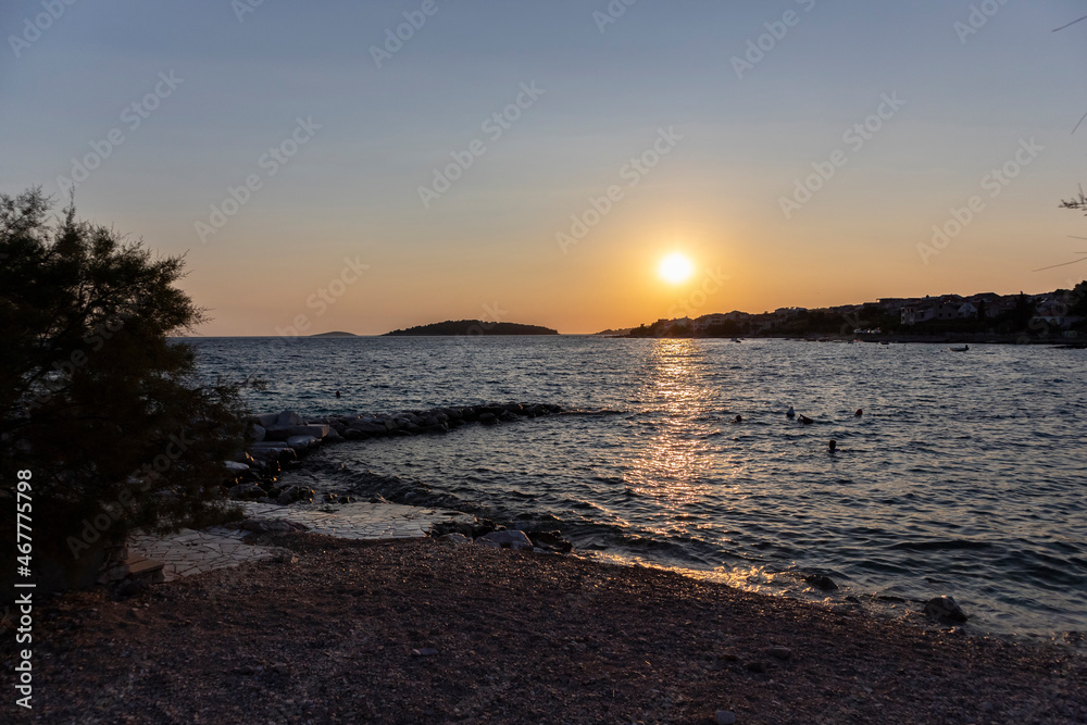 Wonderful summer sunset over Adriatic sea at the coast of Rogoznica, Croatia