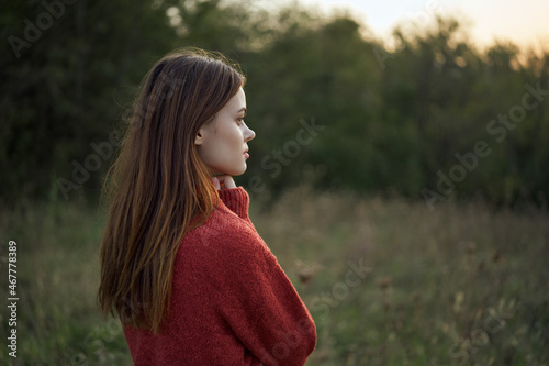 woman outdoors in a field walk fresh air