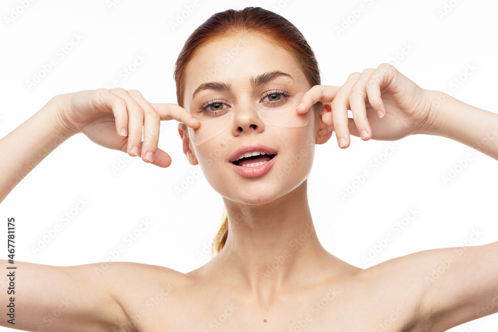 cheerful woman bare shoulders clear skin face mask