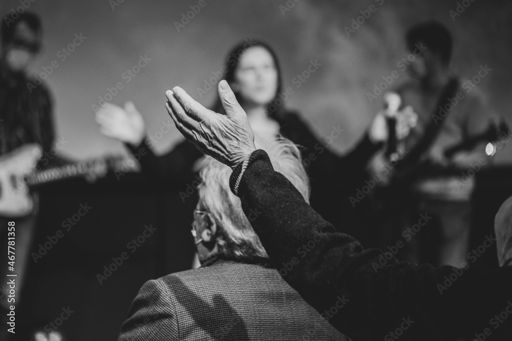 Old man rise his hand while he is praise God at church service Stock ...