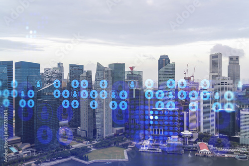 Social media icons hologram over panorama city view of Singapore, Asia. The concept of people networking, connections and career opportunities. Double exposure.
