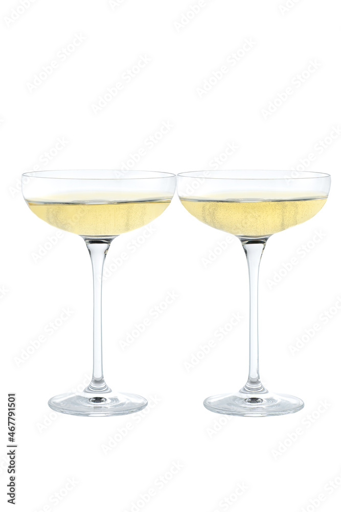 Two champagne coupe isolated on white background.Two glasses of champagne isolated on white background. Two champagne coupe isolated on white background.Two glasses of champagne isolated on white background.