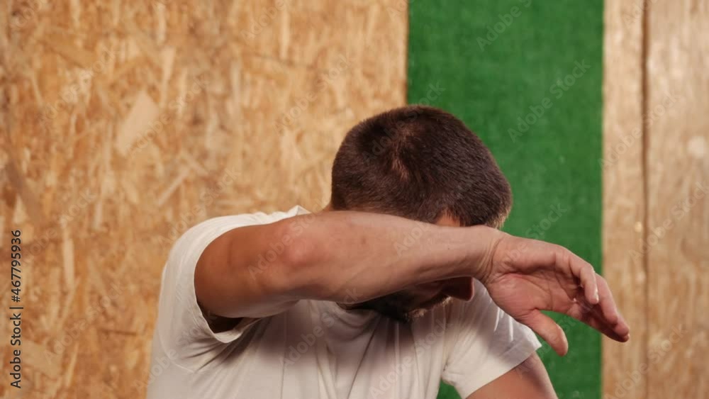 Muscular male body with sweat. Copyspace for text. Close up of tired man Muscular male body with sweat. Copyspace for text. Close up of tired man