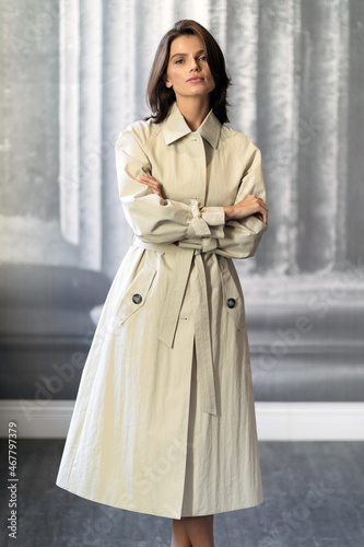 Wallpaper Mural A female model shows off a stylish suit and coat. A fashionable women's clothing store. Torontodigital.ca