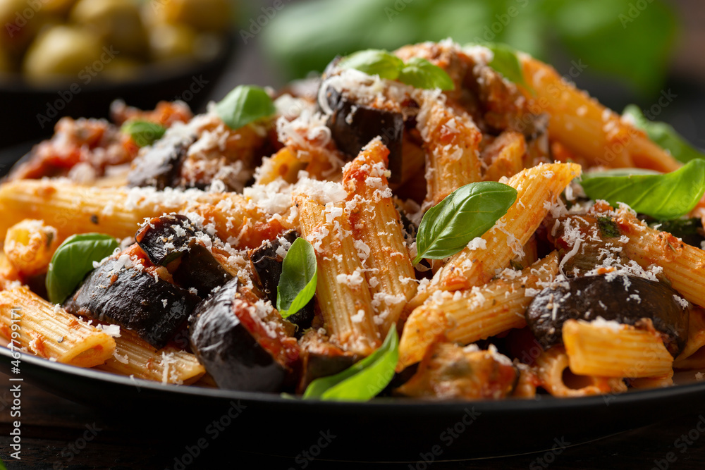 Pasta alla Norma with eggplant or aubergine, tomato, parmesan and basil. Healthy food Pasta alla Norma with eggplant or aubergine, tomato, parmesan and basil. Healthy food