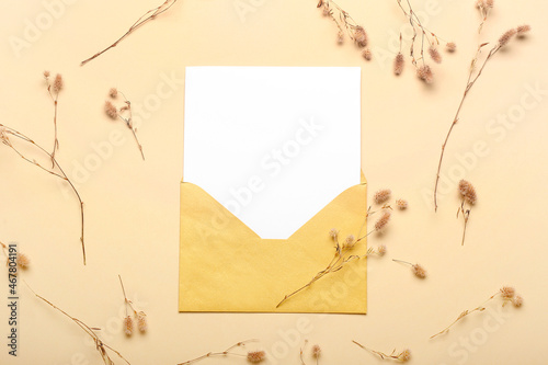 Blank white card in a golde...