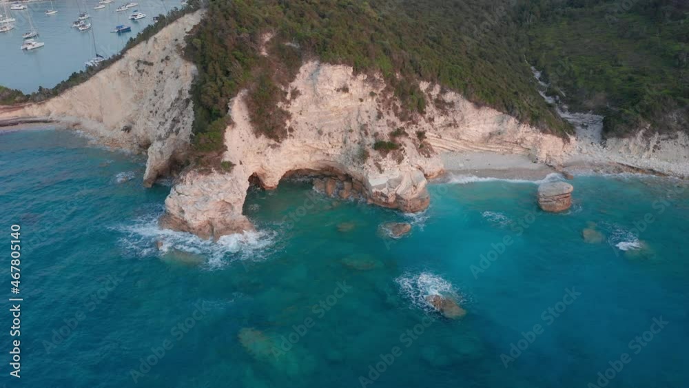 Aerial view of Laka harbour and anchored sailing boats at Paxos island Greece Aerial view of Laka harbour and anchored sailing boats at Paxos island Greece