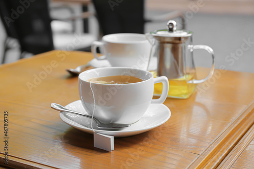 Cups of tea on table in cafe