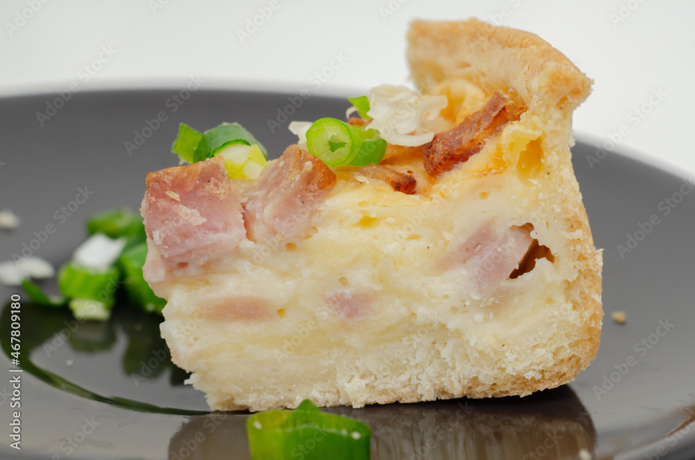 Quiche Lorraine, smoked bacon with medium  and mature cheddar cheese and egg quiche filling in a shortcrust pastry