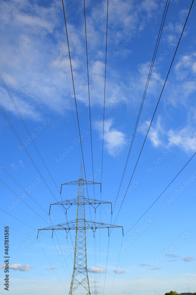 Pylon of the electricity power line on blue sky background.Electricity concept