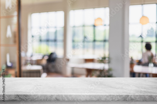 Empty white marble stone table top and interior space of cafe and restaurant banner mock up abstract background - can used for display or montage your products.