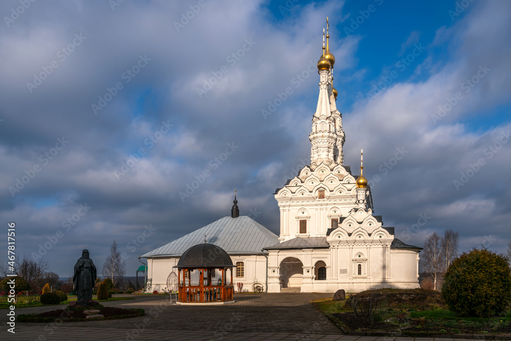 View of the Odigitrievsky Church on the territory of the Vyazma Ioanno-Predtechensky Monastery on a sunny evening with clouds, Vyazma, Smolensk region, Russia