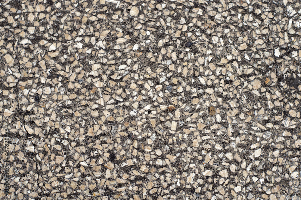 Texture of stone, granite, marble, rustic cobblestones, used for construction or for the elaboration of decorative floors, being very durable over time Texture of stone, granite, marble, rustic cobblestones, used for construction or for the elaboration of decorative floors, being very durable over time