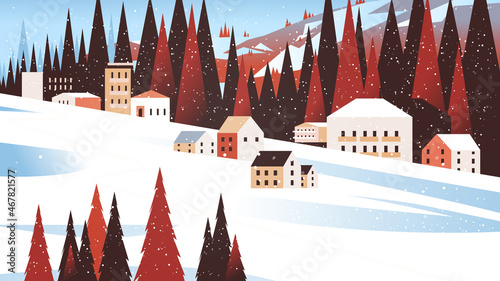 snow covered houses in winter season residential houses area ski resort concept new year and christmas celebration