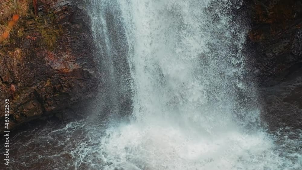 Water falling from the waterfall in slow motion Water falling from the waterfall in slow motion