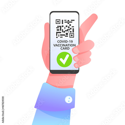 hand holding smartphone with digital immunity passport qr code on screen risk free covid-19 pandemic vaccination