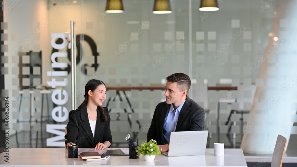 Property insurance male broker offers the best deal to his client. Property insurance male broker offers the best deal to his client.