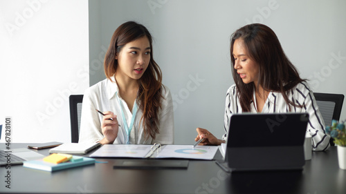 Female business worker planning works together in meeting room
