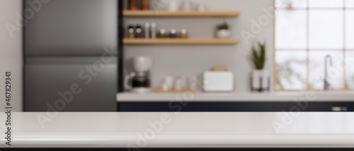 Copy space on luxury granite kitchen counter top in modern kitchen interior background. photo