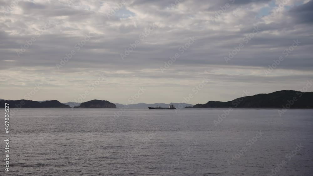 Boat in the Seto Inland Sea with Awaji and Tomogashima Islands in the distance Boat in the Seto Inland Sea with Awaji and Tomogashima Islands in the distance