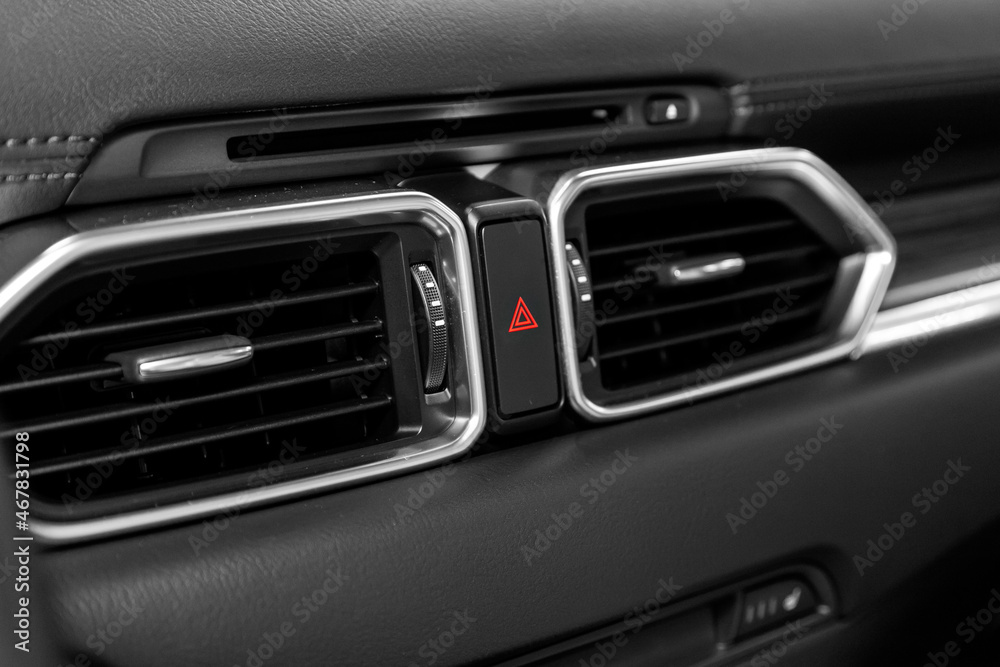 Close up car ventilation  system and air conditioning - details and controls of modern car..