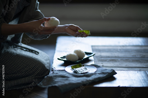 Woman Making Rice Ball photo