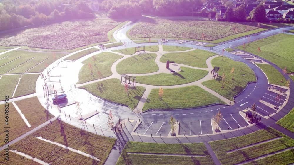 Modern circular cemetery design aerial view artistic garden of rest orbit right above wet shining pathway