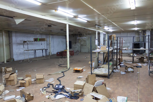 abandoned warehouse with scattered boxes