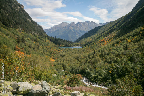 View of a mountain valley in the Caucasus Mountains, Dombay, Russia.