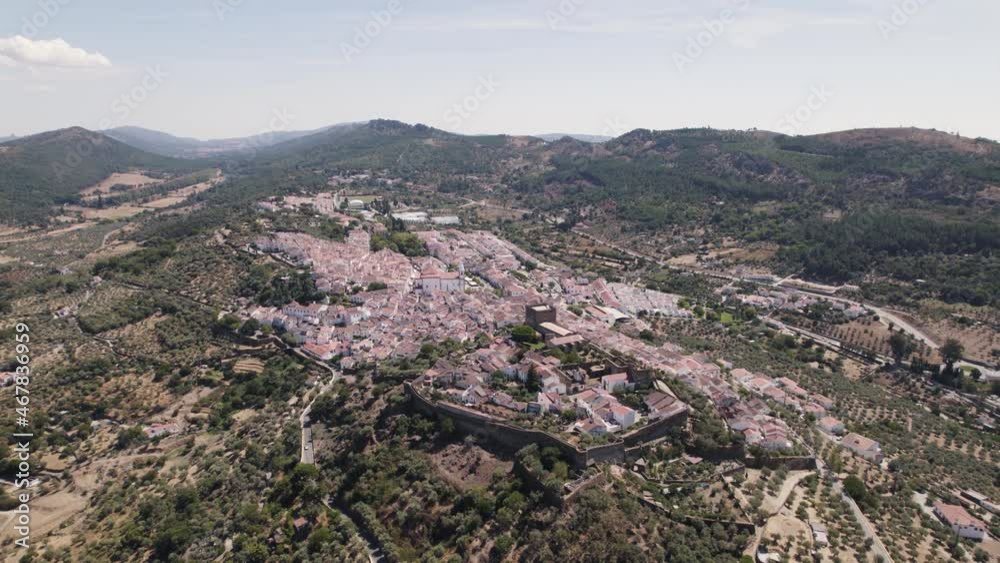 Medieval fortified Castle of Castelo de Vide overlooking charming town, Portugal. Aerial Medieval fortified Castle of Castelo de Vide overlooking charming town, Portugal. Aerial