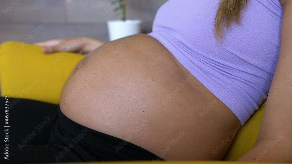 naked pregnant belly of woman in third trimester pregnancy, close up naked pregnant belly of woman in third trimester pregnancy, close up
