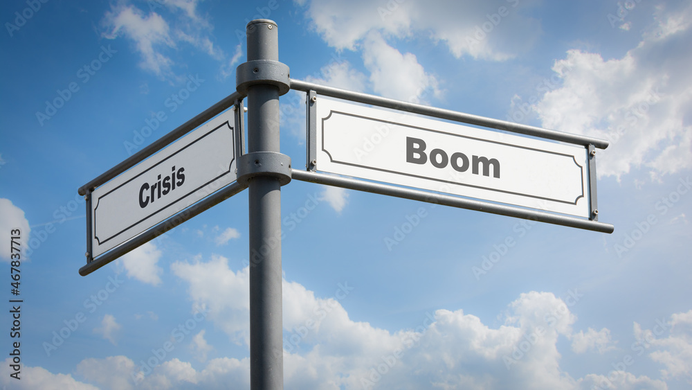 Fototapeta premium Street Sign Boom versus Crisis