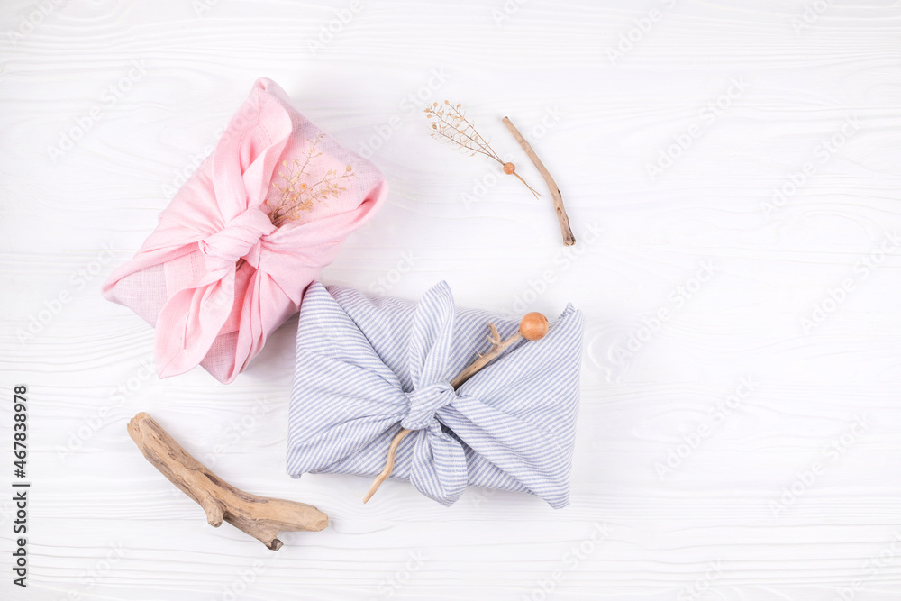 Naklejka premium Christmas furoshiki wrapping. Zero waste concept. Flat lay.