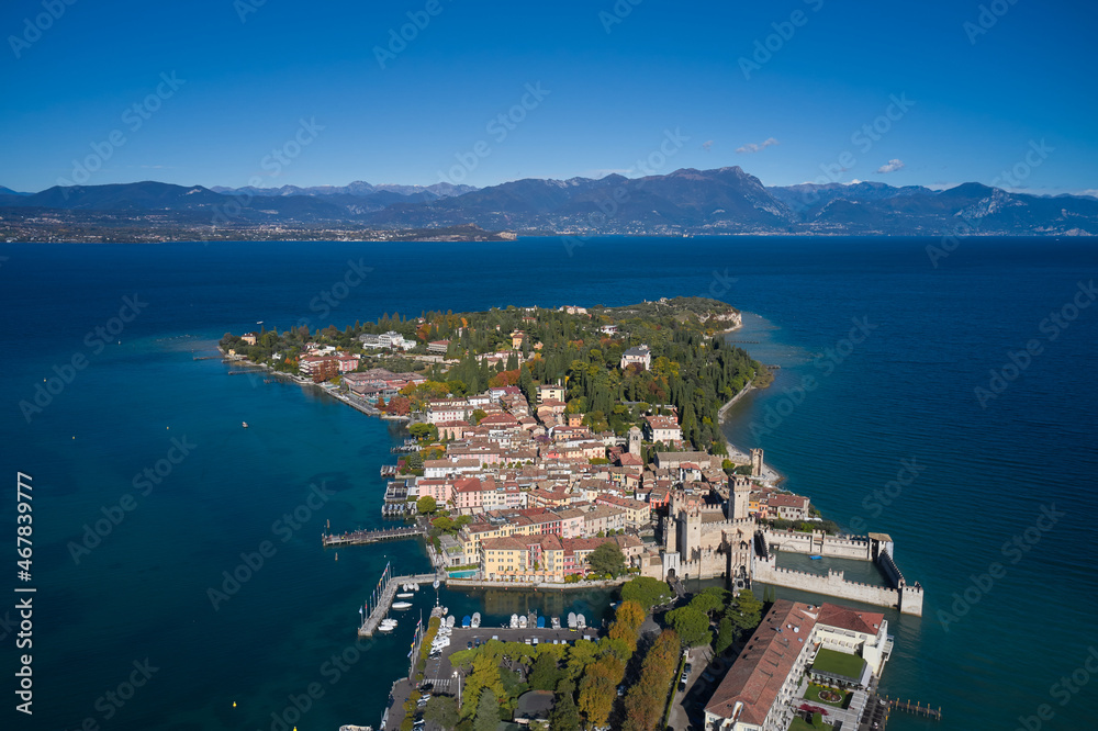Lake Garda, Sirmione, Italy. Italian castle on Lake Garda. Autumn in Sirmione. Sirmione aerial view. Top view, historic center of the Sirmione peninsula, lake garda. Aerial panorama of Sirmione.