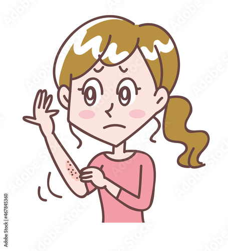 腕が乾燥して痒い女性