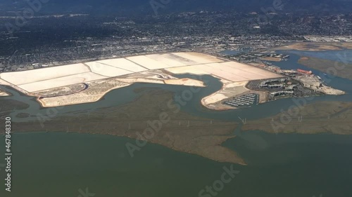 Aerial View Of San Francisco Bay Salt Ponds And Marina Near Redwood City In California. photo