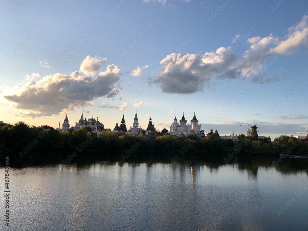 
izmailovsky kremlin on the background of a pond